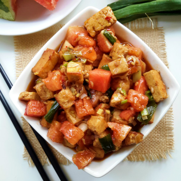 Spicy kung pao tofu with sweet, fresh watermelon. Sounds strange but it works! A savory and refreshing recipe with easy to follow instructions.