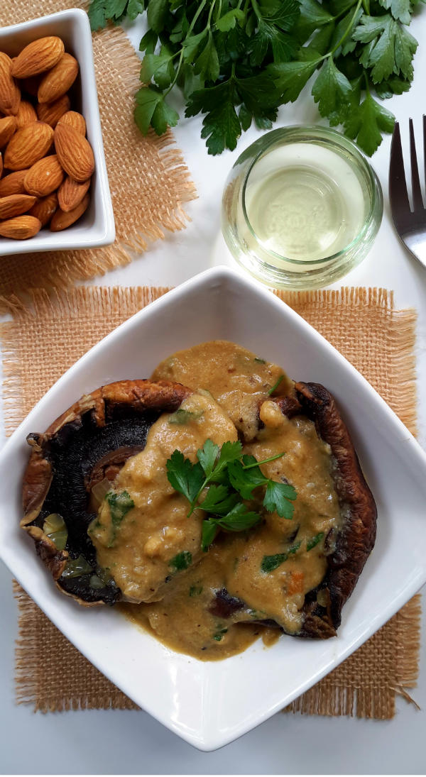 A traditional Spanish recipe vegetarianized with portobello mushrooms prepared in an aromatic sauce of hearty mushroom stock thickened with almonds and flavoured with saffron. Very simple, but very tasty!
