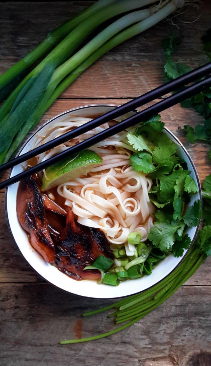 Vietnam's most famous soup made vegan! Start with a killer vegetable broth with a few select spices and add your garnishes. The best part of this dish is the smoky marinated mushrooms.