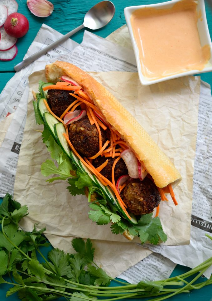 These vegan meatball banh mi are so tasty you'd never guess that they were totally plant-based. Stuffed with fresh herbs, a quick carrot-radish pickle and slathered with spicy vegan sriracha mayonnaise, one of these babies will satisfy every craving!